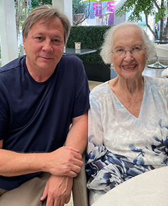 Man with elderly woman